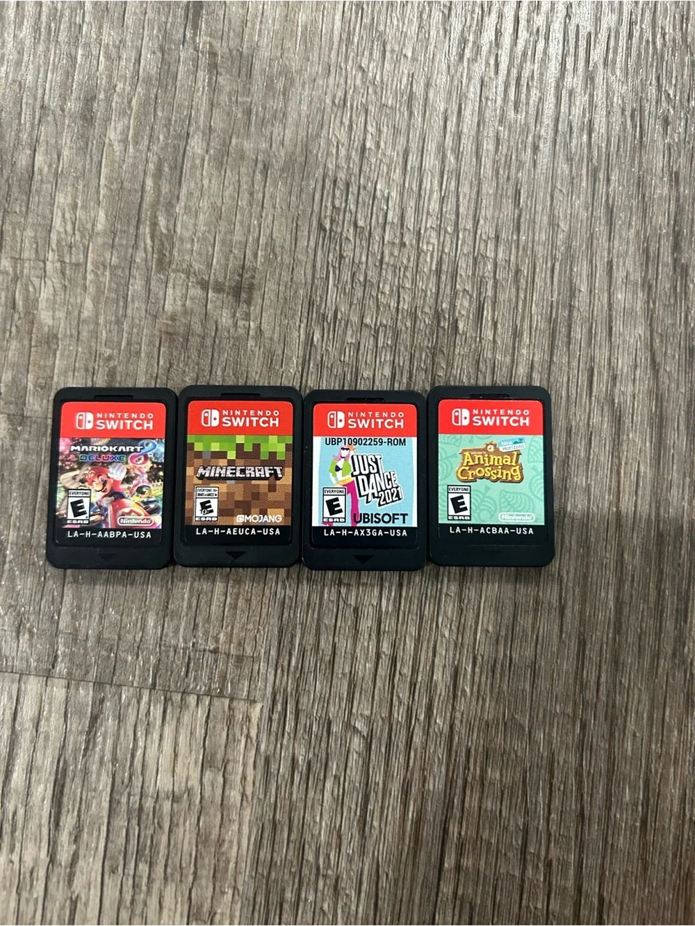 Nintendo Switch with Pink & Red Joy-Con and Blue/Green Accessories